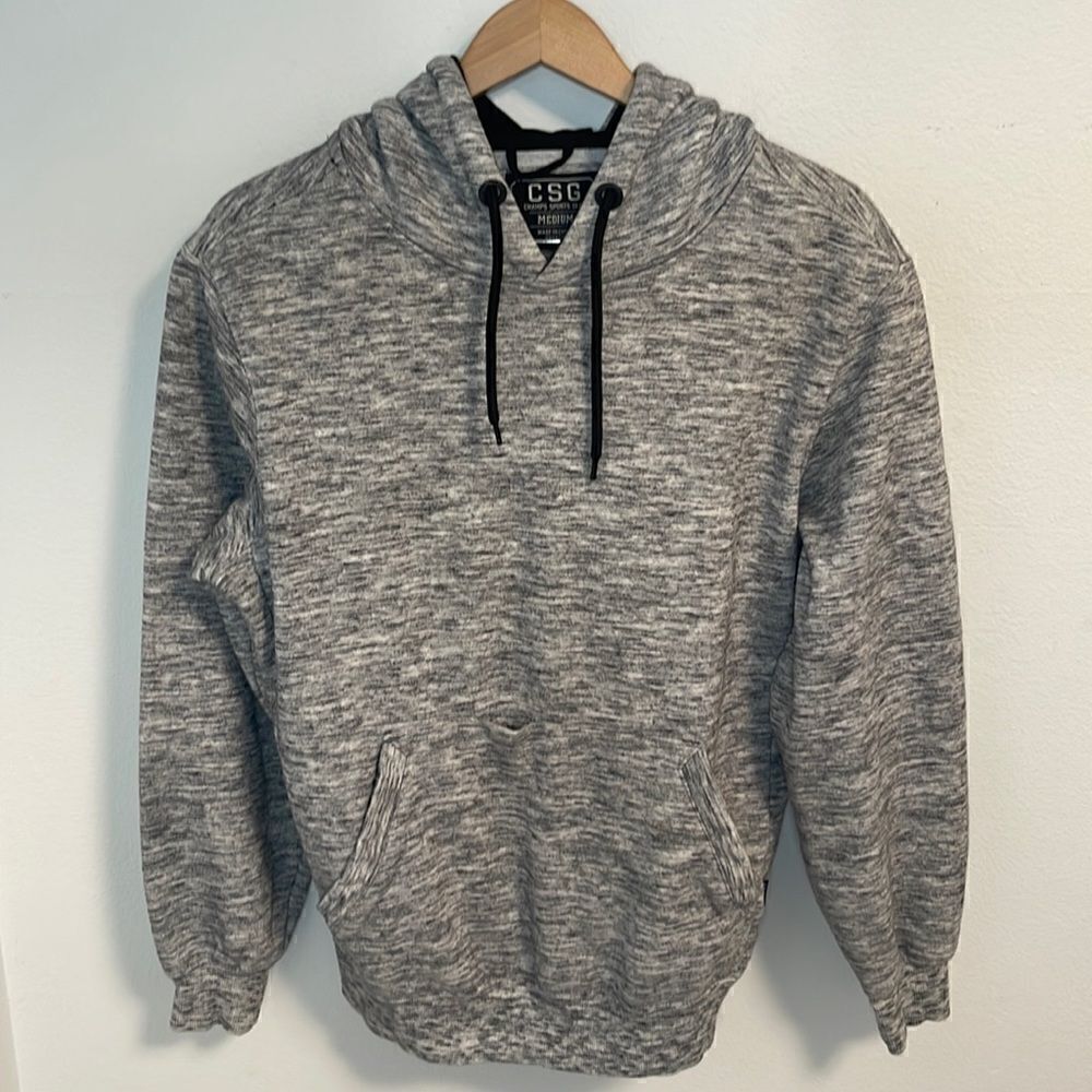 CSG Champs Sports Gear pullover hoodie.  Drawstring hood.  Size Men’s Medium.